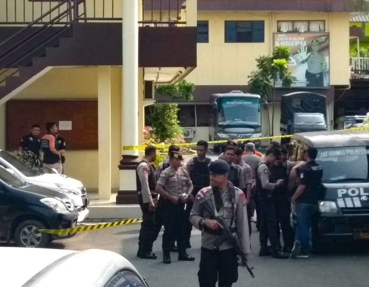 Indonesian police at their headquarters in Medan after the suspected suicide attack