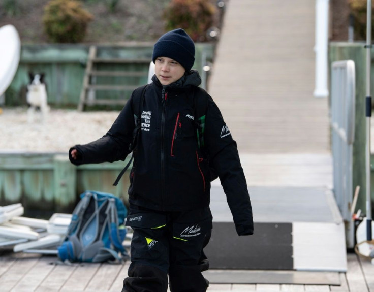 Swedish climate activist Greta Thunberg bords the catamaran "La Vagabonde" as she sets sail to Europe from Hampton, Virginia