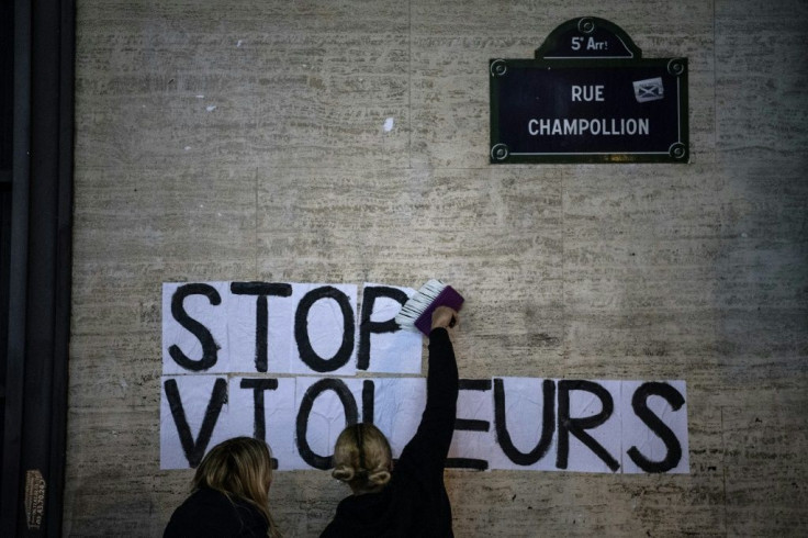 "Stop rapists": Demonstrators stuck a slogan on a wall in Paris close to where Roman Polanski's new film was showing