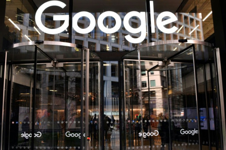In this file photo taken on January 18, 2019 a logo is pictured above the entrance to the offices of Google in London