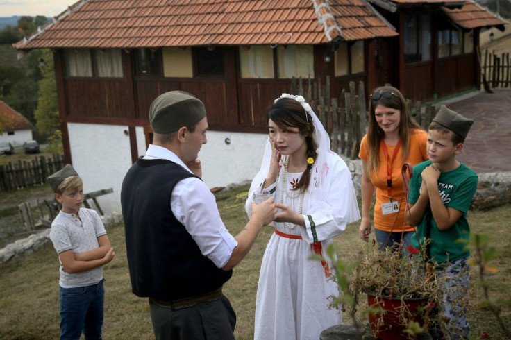 Playing a part in a traditional Serbian wedding is popular among Chinese tourists to the Balkan state