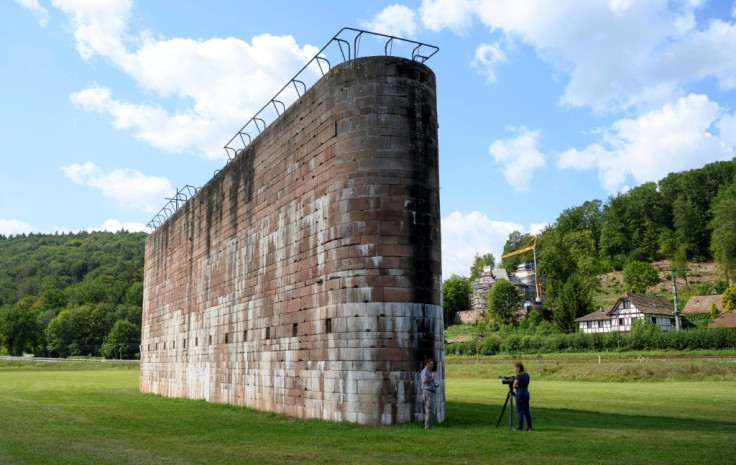 Some of the concrete columns that would have supported a bridge along Route 46 still stand