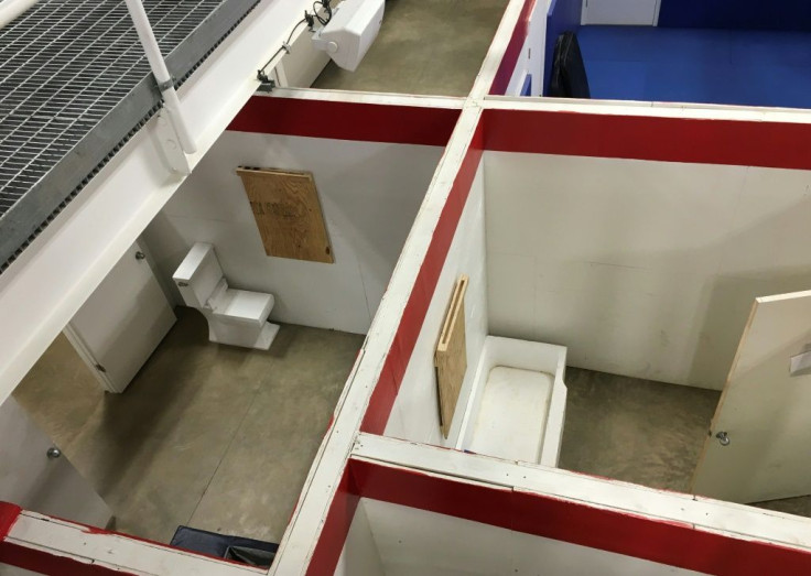 A building is set up to be a maze with 40 doors at a new security training center for US personnel deployed overseas