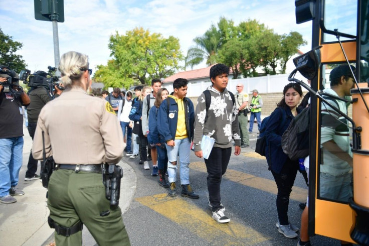 Students were evacuated by bus after a shooting at Saugus High School in Santa Clarita, California
