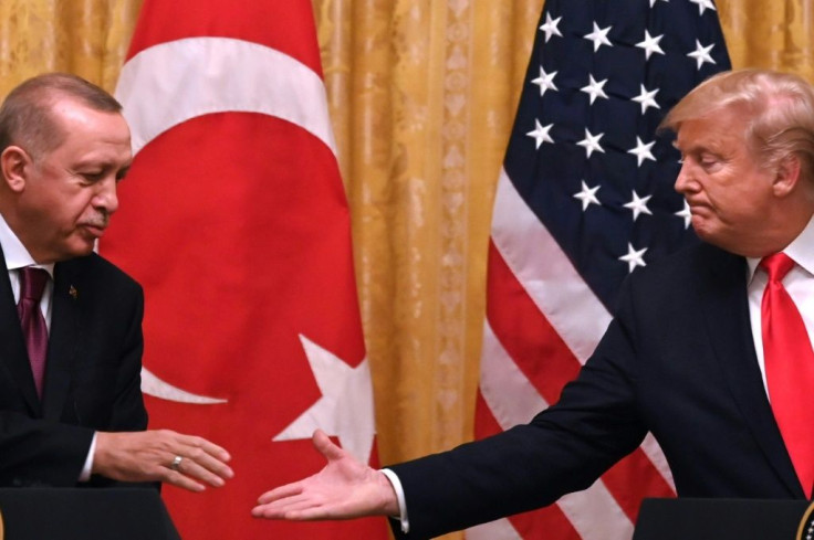 US President Donald Trump met with Turkey's President Recep Tayyip Erdogan on Wednesday and said he was too busy to watch the impeachment hearings