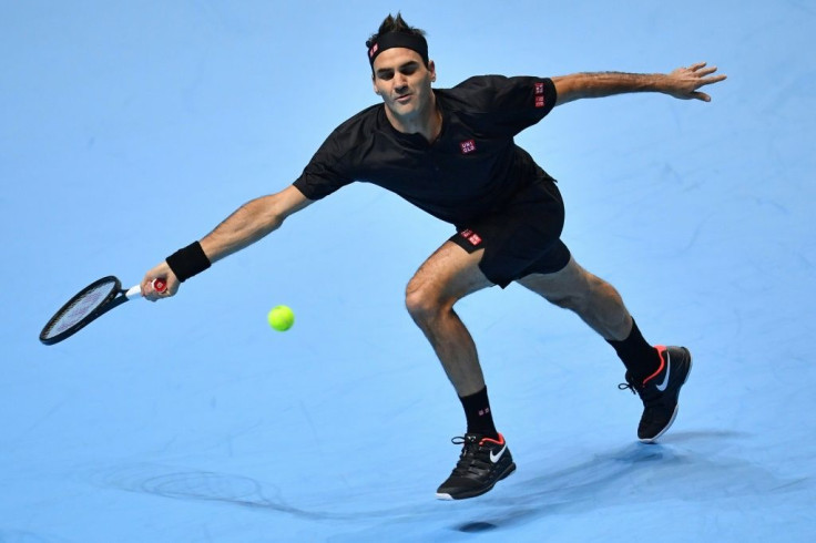 Roger Federer in action against Novak Djokovic at the ATP Finals