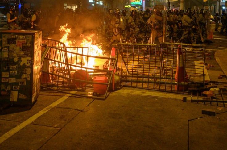 Hong Kong stocks have taken a heavy hit from increasingly violent protests that have jammed up parts of the city for the past five days and fuelled fears of intervention from China