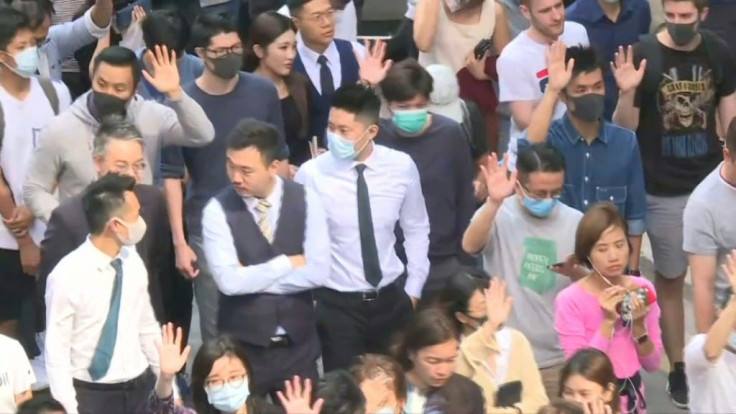 IMAGESHong Kong's central business district, in recent days, has seen thousands of office workers protest during lunch hours and to show their solidarity to the pro-democracy movement. Friday afternoon was no exception.