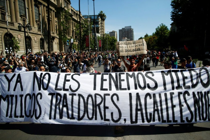 Protesters demonstrate on October 21, 2019, the fourth straight day of clashes with riot police, following protests over a hike in metro ticket prices