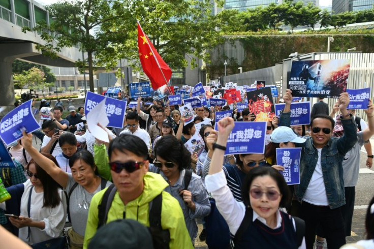 A group of around 500 people staged a rally near the government headquarters in support of the Hong Kong police force