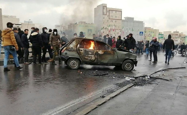 Protests in Iran against petrol price hikes and rationing have left one dead and more injured