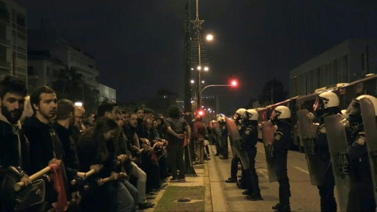Demonstrators arrive at the US embassy in Athens to mark the anniversary of a 1973 uprising against a US-backed junta