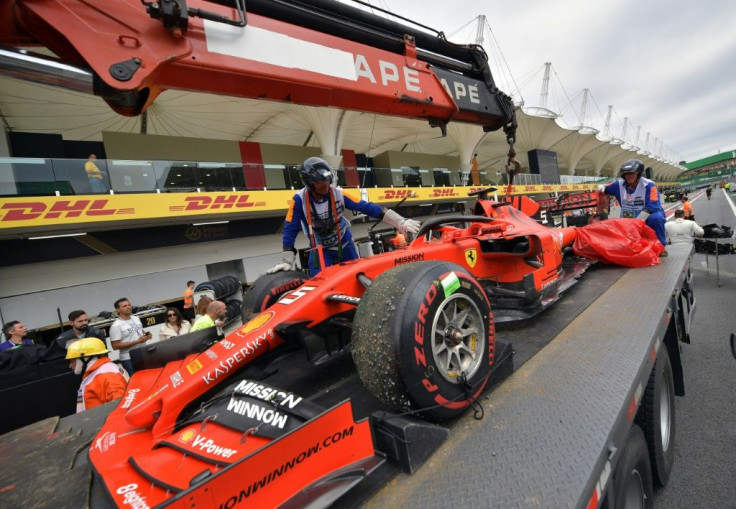The damaged car of Ferrari's Sebastian Vettel