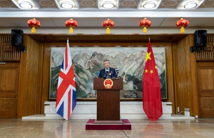 China's ambassador to Britain Liu Xiaoming warned Beijing would not 'sit on our hands and watch' if the situation in Hong Kong spiralled out of control