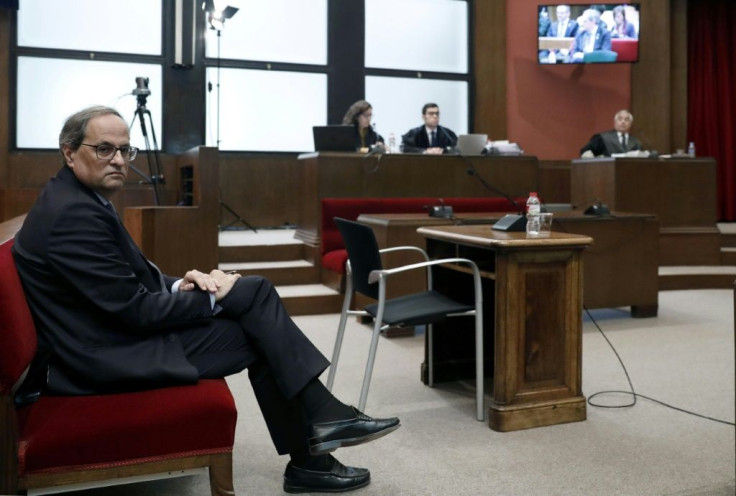 Catalan regional president Quim Torra told the court in Barcelona he had disobeyed orders from electoral authorities to take separatist symbols down from public buildings