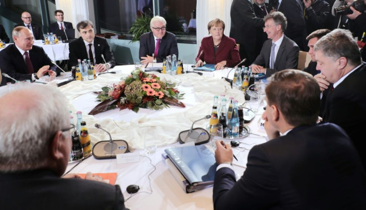 German Chancellor Angela Merkel hosting  Russian President Vladimir Putin (l) and Ukrainian President Petro Poroshenko (2nd r) during the last 'Normandy Format' meeting in Berlin in October 2016