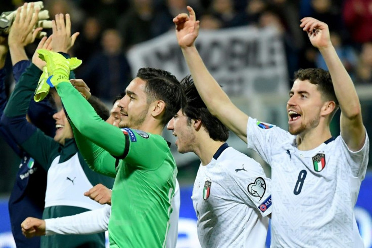 Italy players celebrate after their 9-1 rout of Armenia in Palermo