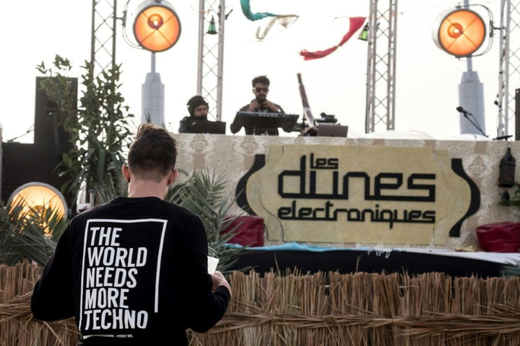 A DJ plays at the electronic music festival "Les Dunes Electroniques" at Ong Jmel, near the town of Nefta