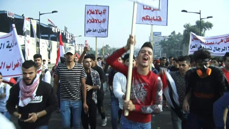 Iraqi anti-government demonstrators react to the protests that erupted in Iran after a suprise announcement to impose petrol price hikes and rationing. Reports on a trove of leaked Iranian intelligence documents drove home the depth of its influence in Ir