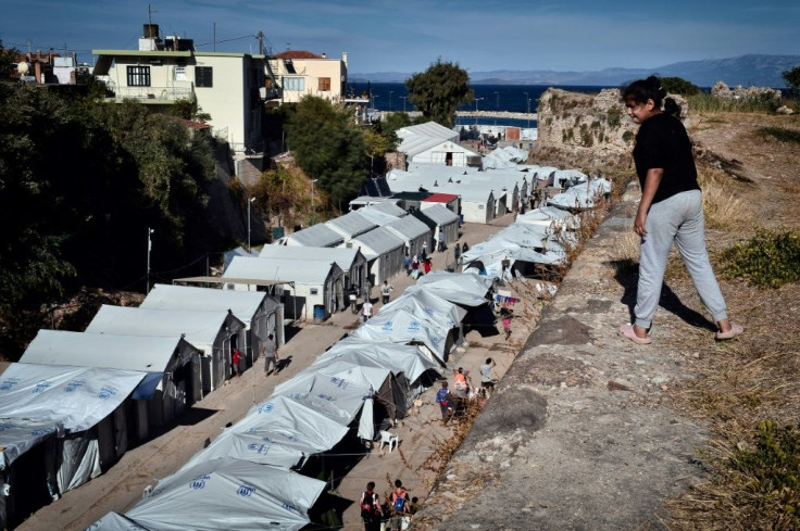 The Greek government said it would replace the overcrowded camps with new closed facilities