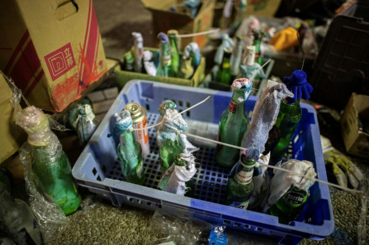 Hong Kong's hardcore protesters have held off riot police with Molotov cocktails, bricks and arrows