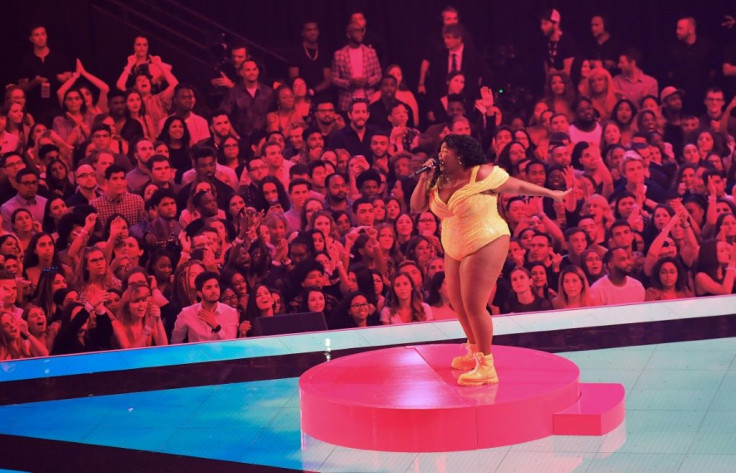 US singer Lizzo -- seen here performing during the 2019 MTV Video Music Awards in August 2019 -- earned eight Grammy nominations to lead the field
