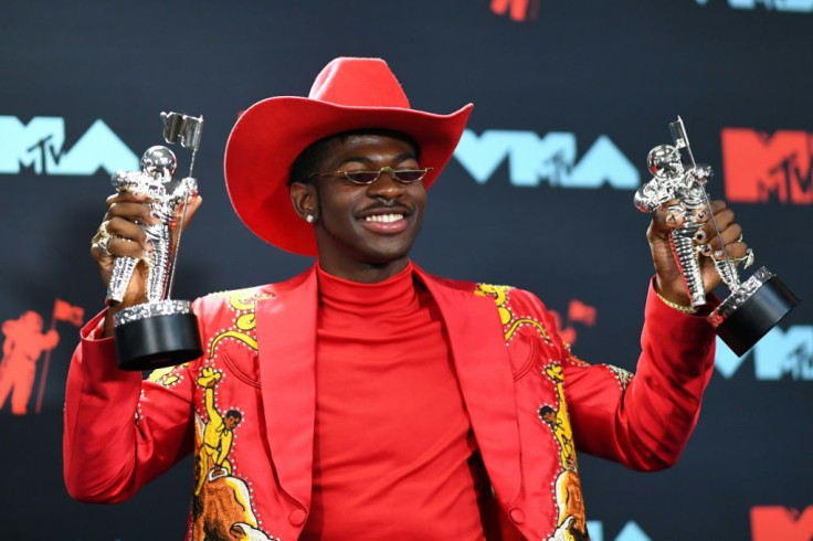 US rapper Lil Nas X -- posing with the Song of the Year Award at the 2019 MTV Video Music Awards in August 2019 -- is up for six Grammys