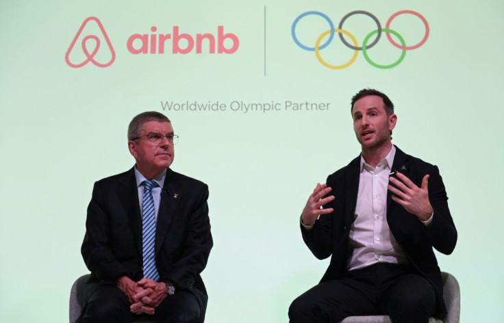 IOC President Thomas Bach, left, announced the deal at a London press conference with Airbnb co-founder Joe Gebbia on Tuesday