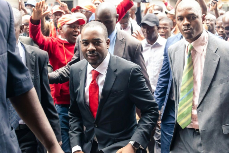 Zimbabwean opposition leader of the MDC (Movement for Democratic Change) Alliance, Nelson Chamisa(C), condemned the police crackdown