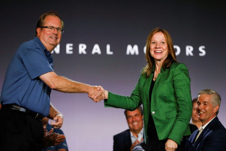 The UAW moved to expel President Gary Jones, shown here in July with General Motors CEO Mary Barra, as it seeks to move past a corruption scandal