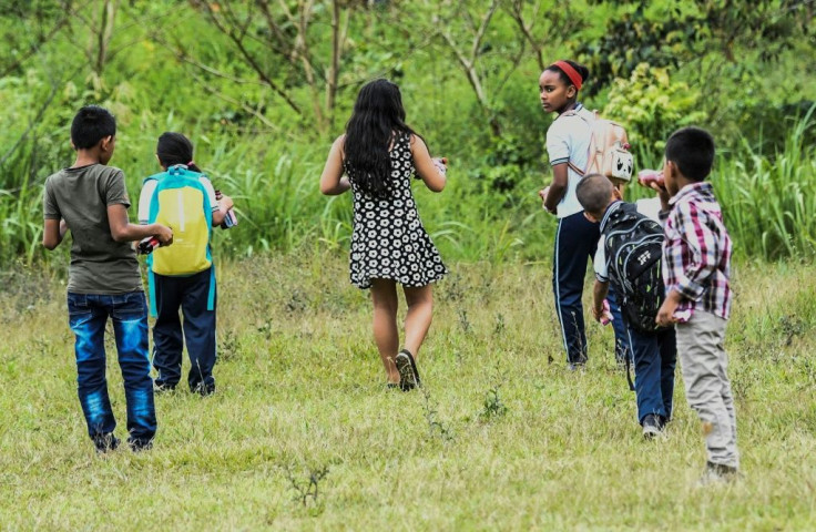 Children of former FARC combatants play in Columbia's La Montanita municipality