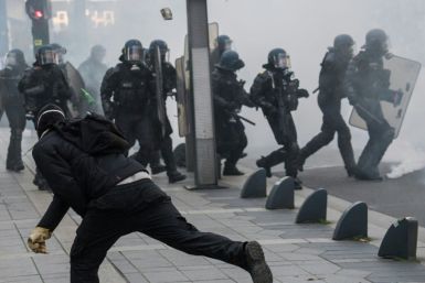 Riot police officers faced off against demonstrators during a "yellow vest" protest in Nantes, western France, on November 16, 2019.