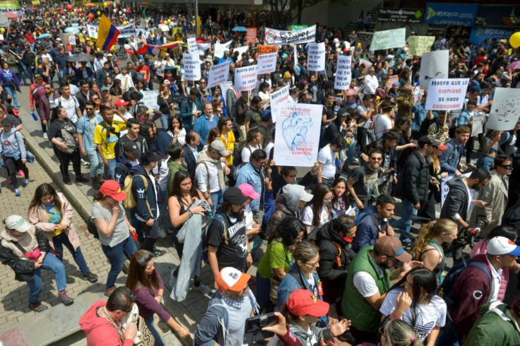 People march in Bogota during a nationwide strike