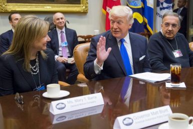 GM Chief Executive Mary Barra and the late FCA Chief Executive Sergio Marchionne, shown here with President Donald Trump at a White House meeting in January 20017, are key players in GM's lawsuit against FCA