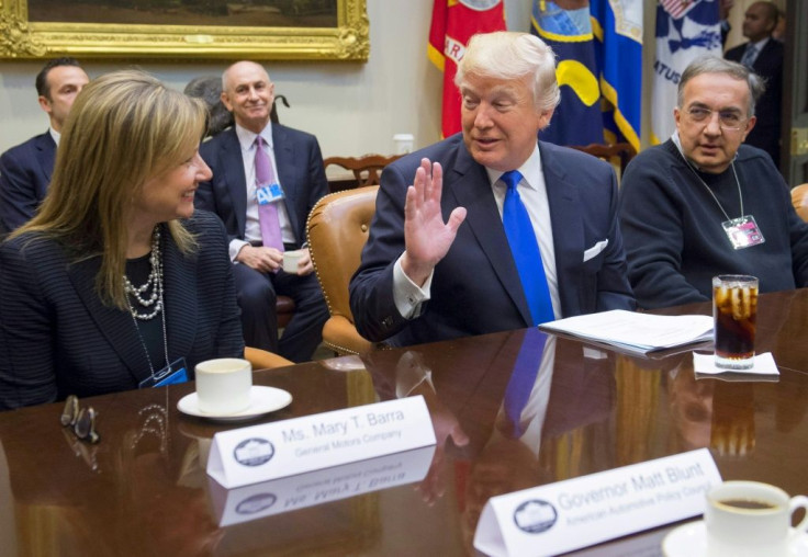 GM Chief Executive Mary Barra and the late FCA Chief Executive Sergio Marchionne, shown here with President Donald Trump at a White House meeting in January 20017, are key players in GM's lawsuit against FCA