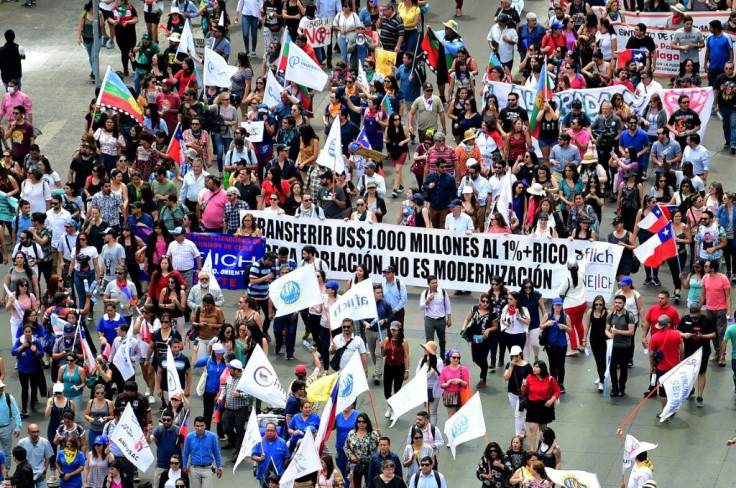 Demonstrators marched in front of the presidential palace in Santiago, Chile on November 21, 2019