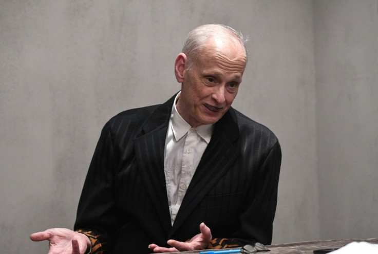 John Waters says it is important to make people laugh in the hope he can make them examine and moderate their views