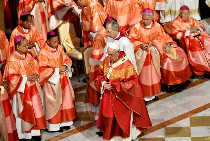 Pope Francis's second mass in Thailand was packed with bishops wearing brilliant red and gold robes custom-made for the occasion