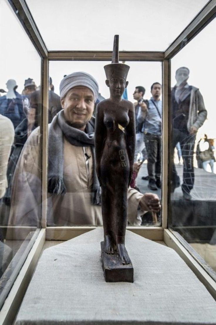 A wooden statue of the goddess Neith from the hoard unveiled at Saqqara south of Cairo on November 23, 2019