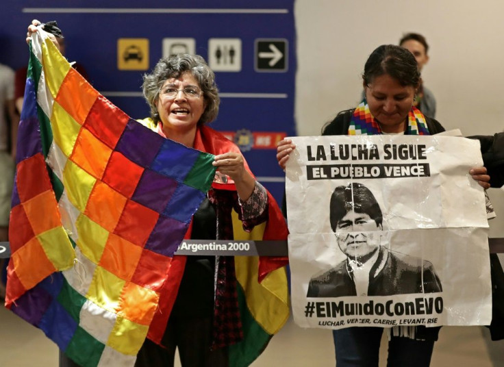 Bolivian citizens living in Argentina wait at the Buenos Aires airport for the arrival of former Bolivian president Evo Morales's children Evaliz and Alvaro. They were granted political asylum in Argentina