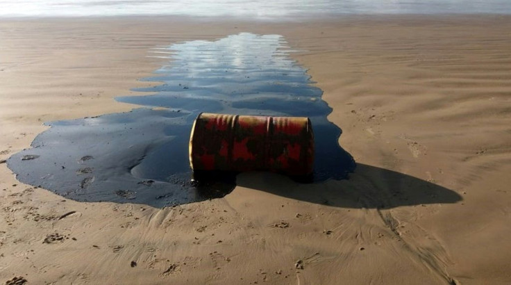 A barrel of oil spilled on a beach in Barra dos Coqueiros municipality, Sergipe state, Brazil, is pictured in September 2019 in a handout photo from the Sergipe State Environment Administration