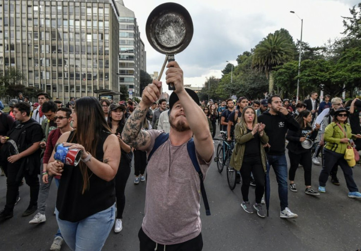 People banged pans while protesting against the government of President Ivan Duque in Bogota on November 23, 2019