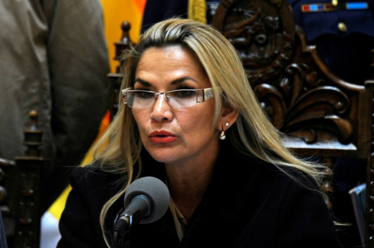 Bolivia's interim president Jeanine Anez (pictured November 23, 2019) signed a bill for new elections, vowing the process would be "clean, just and transparent"