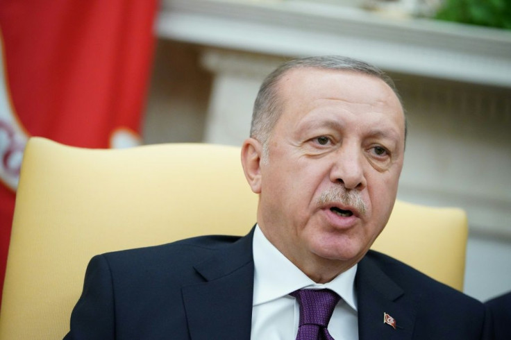 The burgeoning relationship saw Turkey's military presence in Qatar increased; Turkey's President Recep Tayyip ErdoÄan is pictured in Washington on November 13, 2019
