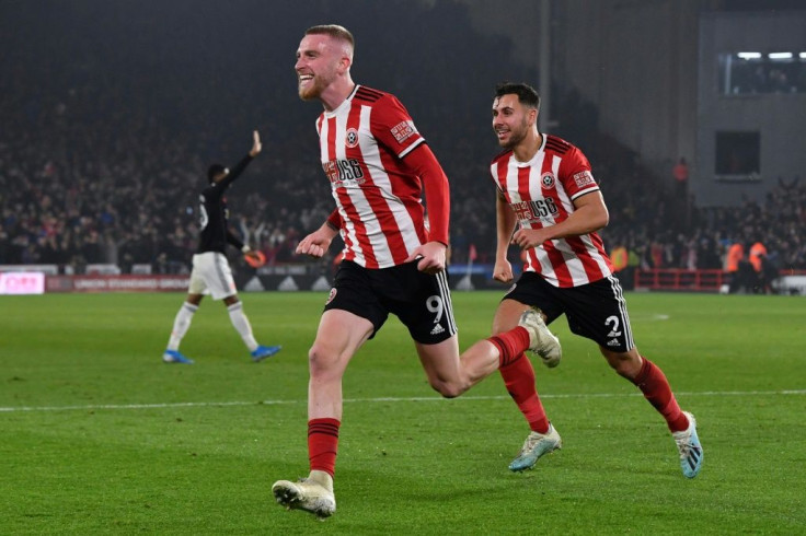 Oliver McBurnie celebrates after scoring Sheffield United's equaliser in a 3-3 draw against Manchester United