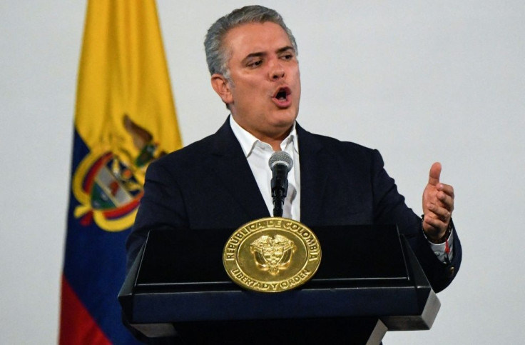 Colombian president Ivan Duque speaks after meeting with Mayors in Bogota on Sunday as he opened a national dialogue aimed at assuaging popular anger
