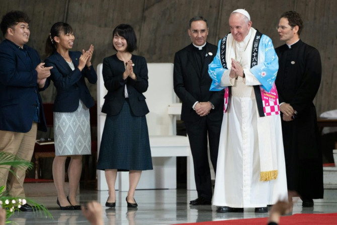Pope Francis delighted the crowd by donning a traditional Japanese 'happi', worn for festivals