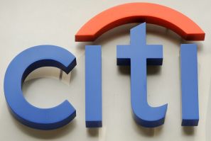 US banking giant Citigroup was handed a record fine of almost Â£44 million ($57 million, 51 million euros) by British authorities for "serious and widespread" reporting breaches
