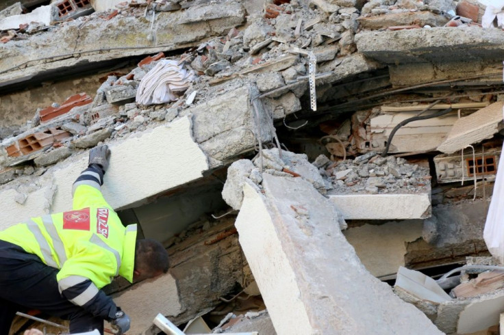 Emergency workers are hunting for survivors in the debris of a damaged building in the coastal city of Durres