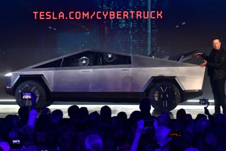 Tesla co-founder and CEO Elon Musk presentING the all-electric battery-powered Tesla